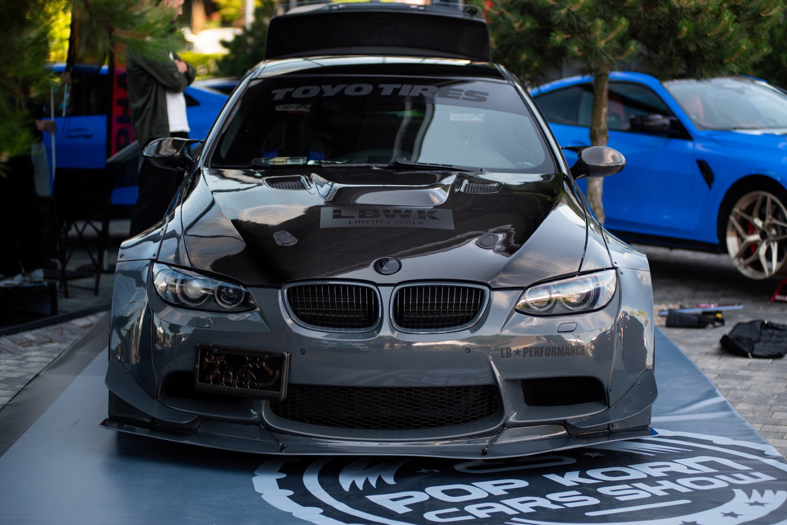 Lviv, Ukraine - July 12, 2025 : Popcorn Cars Show 2025 in Ukraine gathered a wide range of classic, customized, luxury, and high-performance vehicles during a large-scale open-air automotive exhibition. The event showcased tuned cars, lowered stance builds, vintage models, and modified sports cars, attracting car enthusiasts, photographers, and media from across the region.