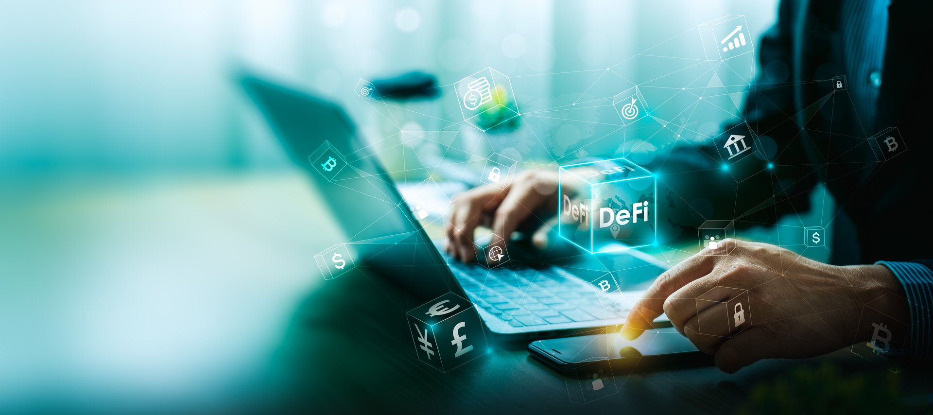 Hands using laptop and smartphone with holographic decentralized finance or DeFi, Digital Curry and Blockchain Network, showing modern financial technology and online transactions.