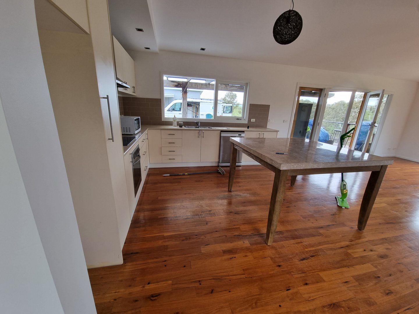 Quality Painting Group project - July 2022 elegant lounge transformation showing sophisticated neutral palette and premium finishes