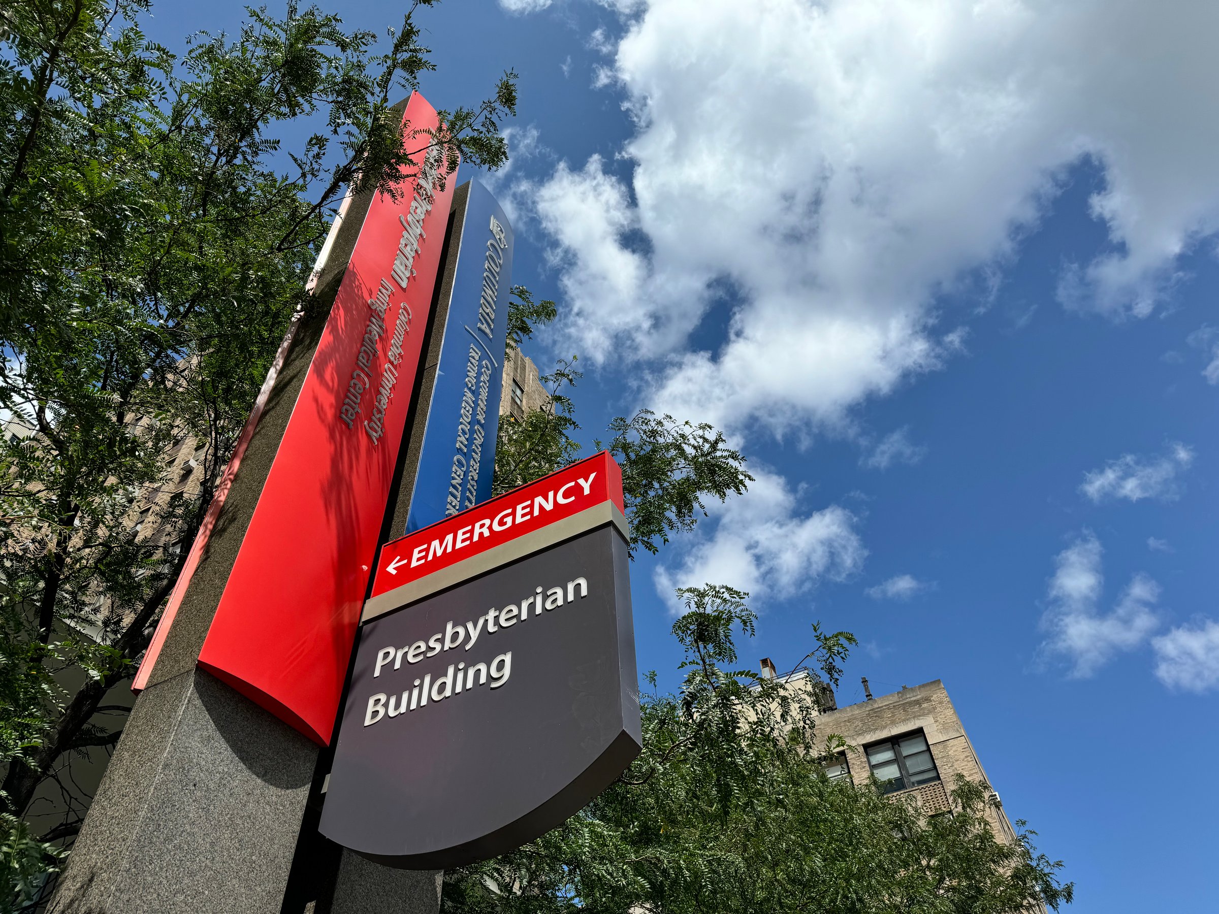 New York, NY USA - August 21, 2024 :  Red emergency sign in front of New York Presbyterian Columbia University Irving Medical Center on Broadway in Washington Heights, Manhattan, New York City