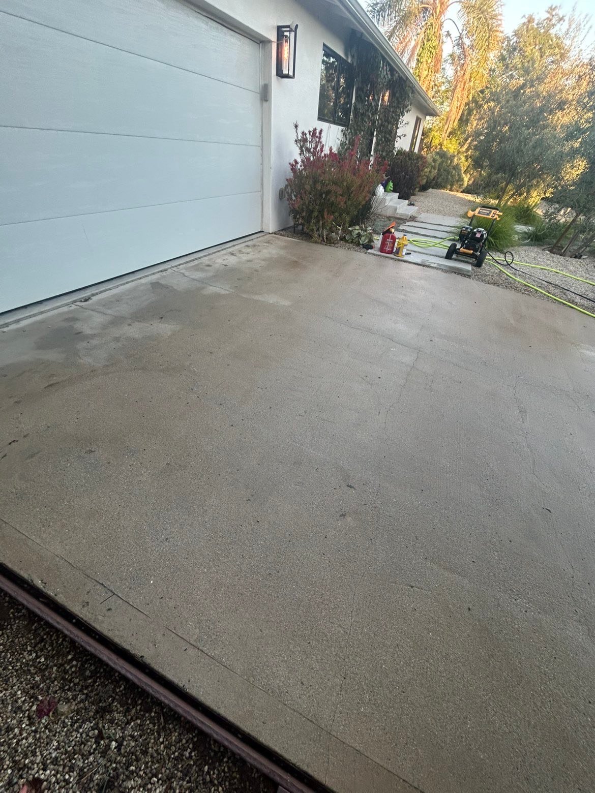 Clean walkway after pressure washing showing restored surface