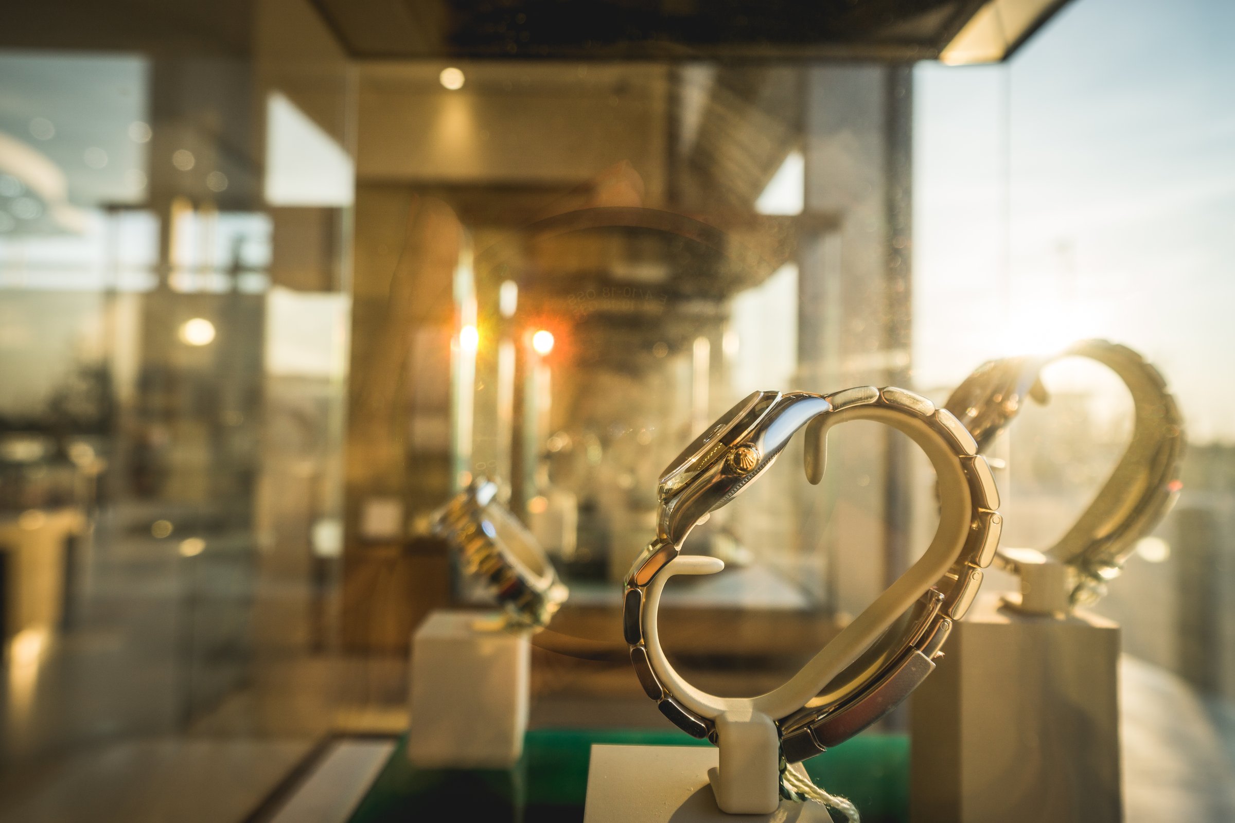 Sun ray on luxury watches in display case