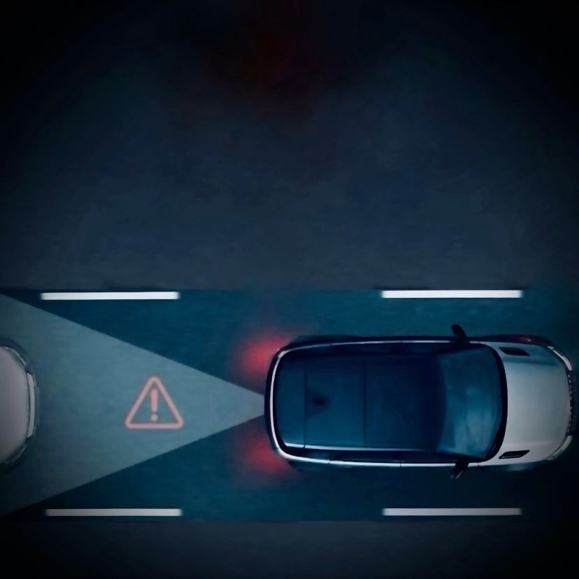 Rear collision monitor displaying warning of approaching vehicle from behind