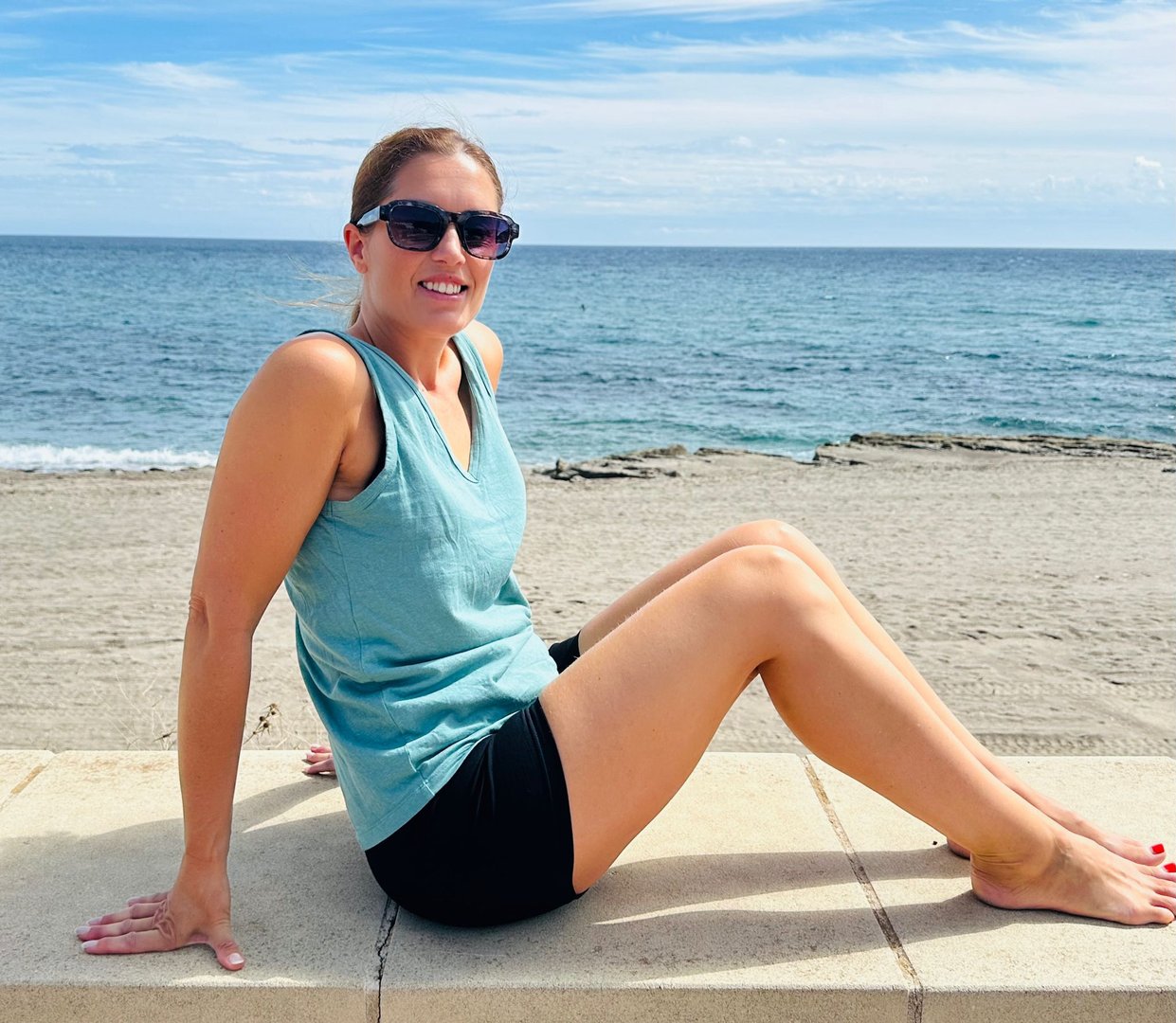 Pilates instructor demonstrating exercise