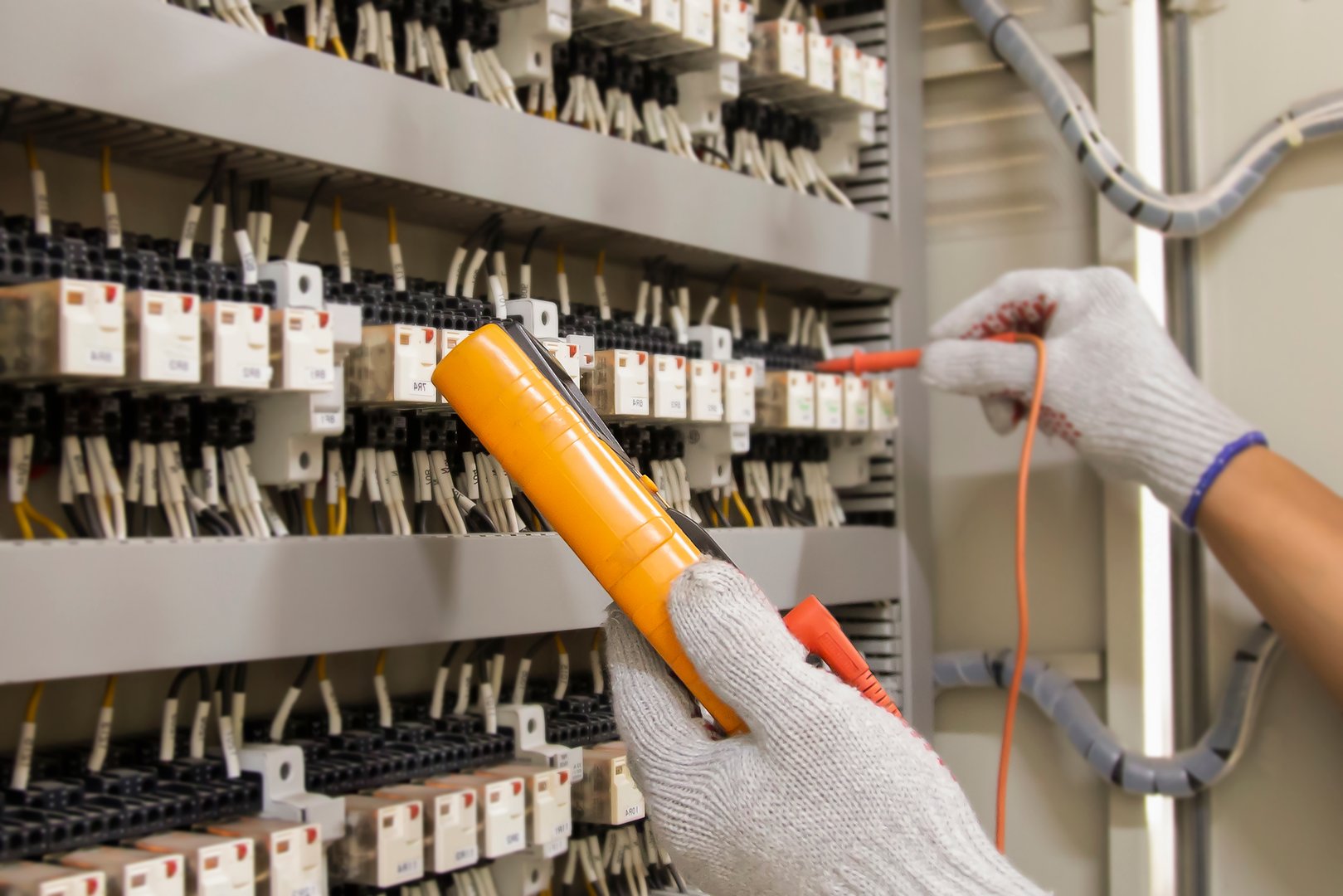 Technicians use multimeter to test or diagnose electrical control devices.
