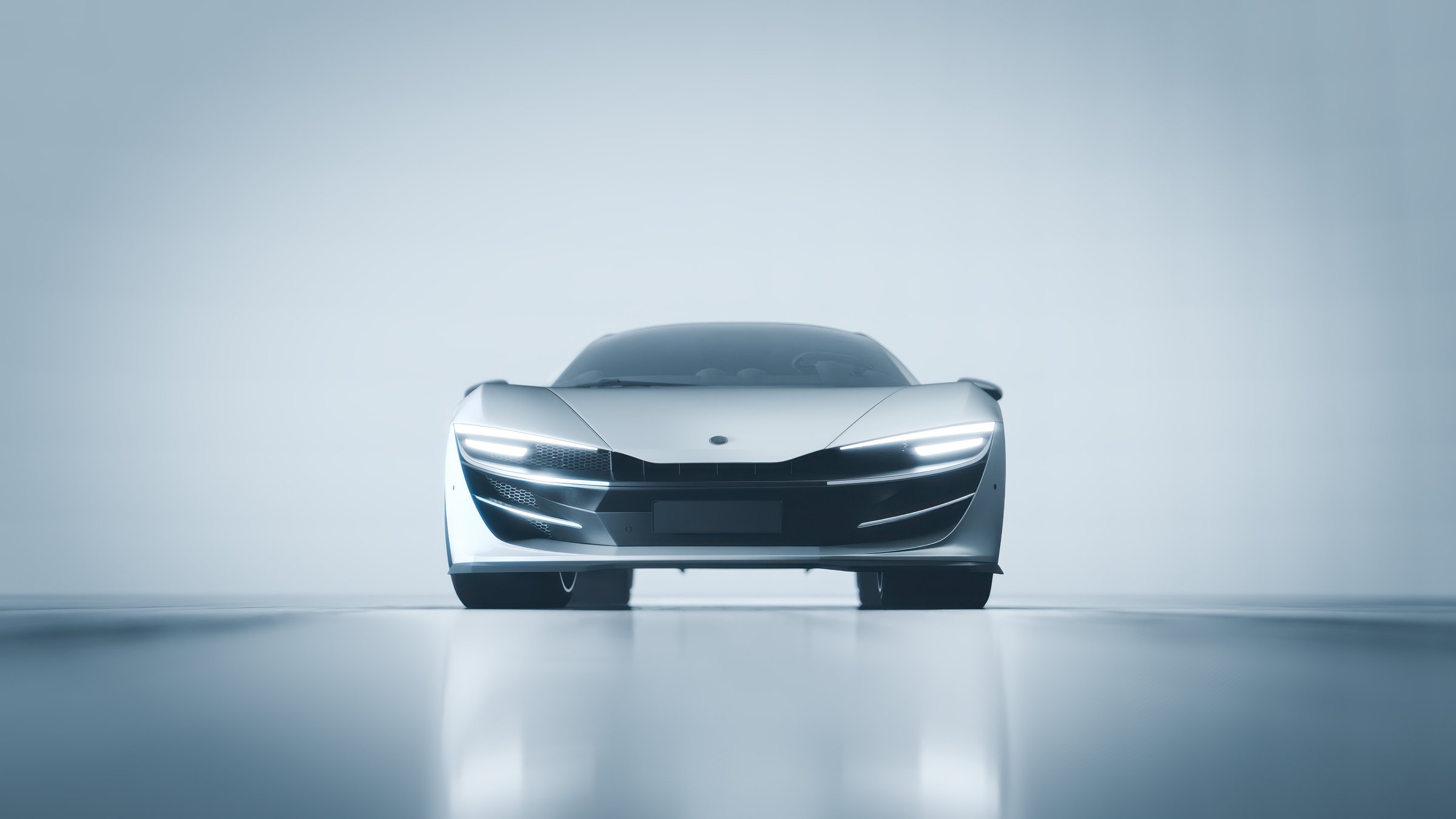 Sleek white sports car parked on reflective floor in a professional studio environment