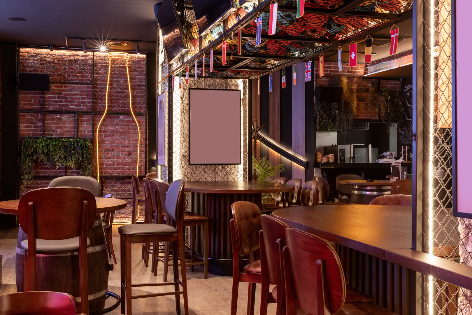Interior of a sports bar with brick walls and wooden seating