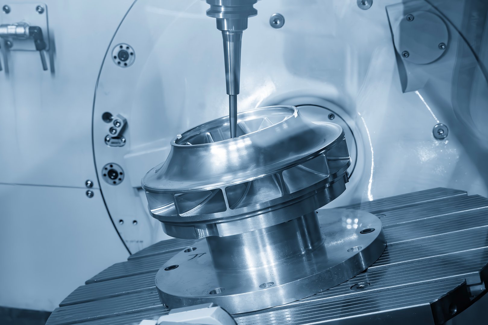 The 5-axis CNC milling machine cutting the high precision turbine part with solid ball end mill tool. The hi-technology water turbine part manufacturing process by multi axis CNC milling machine.