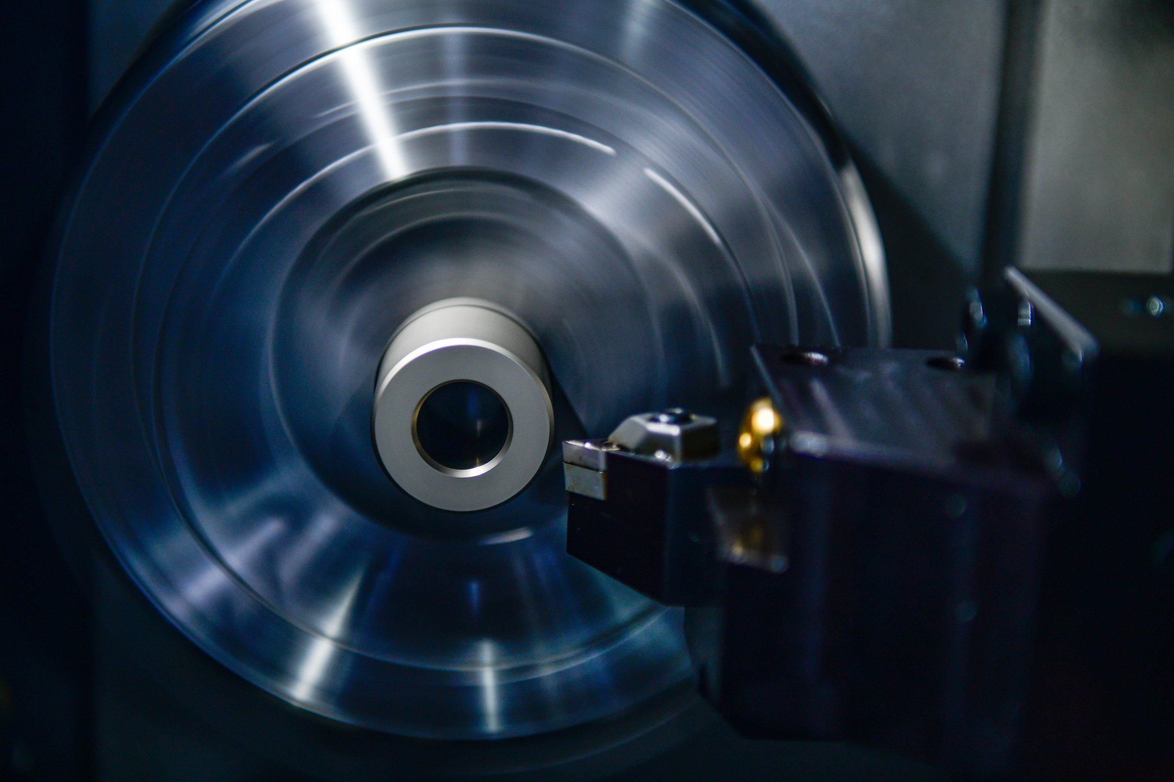 CNC milling machine during deburring of parts, heavy industry plan