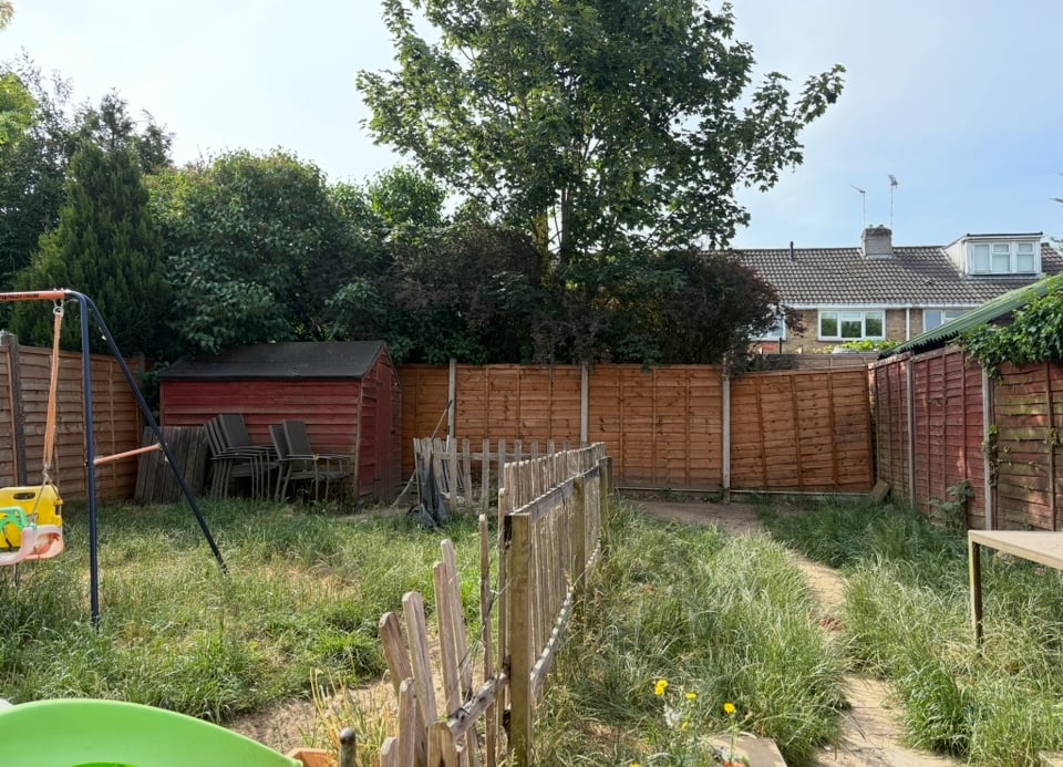 Garden area with difficult access and no side entrance before transformation
