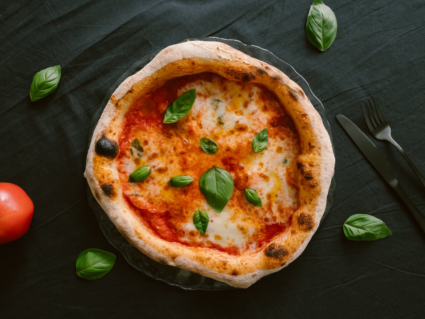 Delicious Neapolitan pizza Margherita close-up, top view