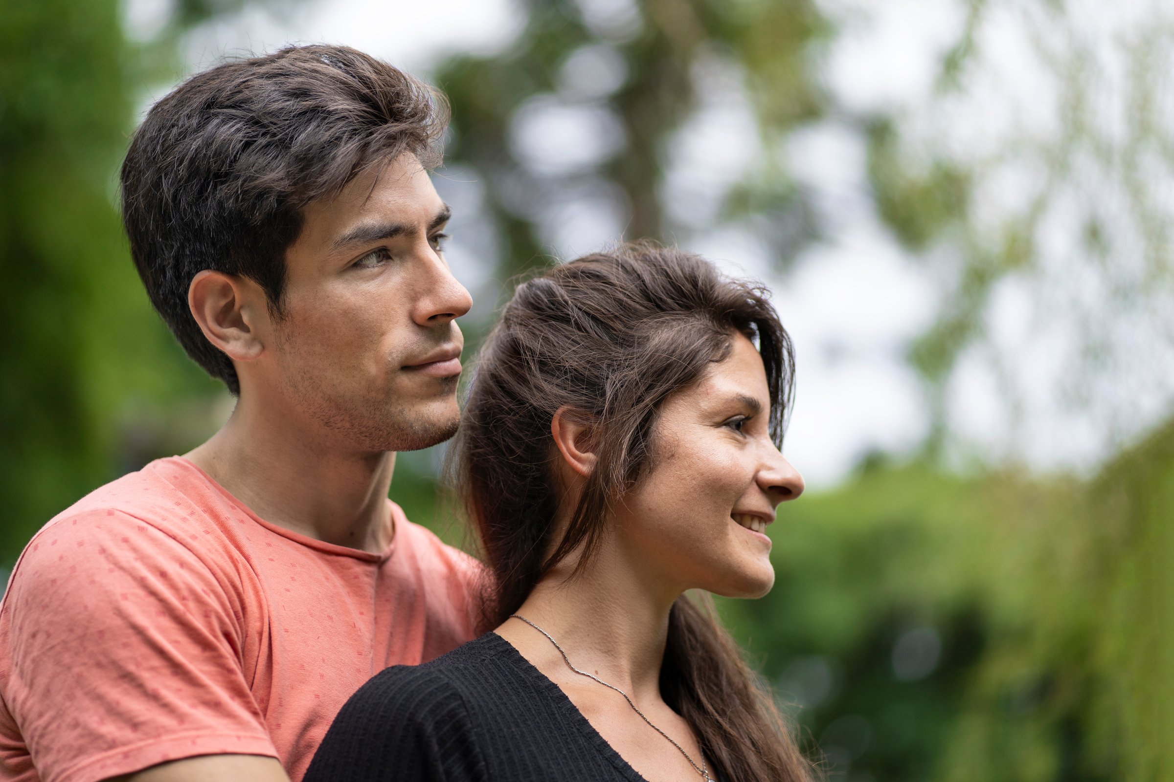 Close-up portrait of young couple in love in the park