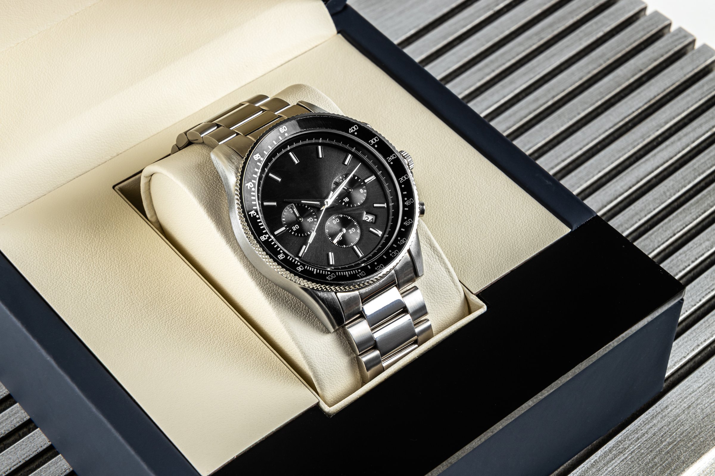 Modern men's wristwatch with black dial