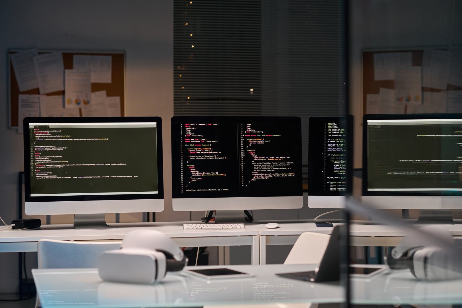 Background image of three computer screens with code lines cybersecurity office, copy space