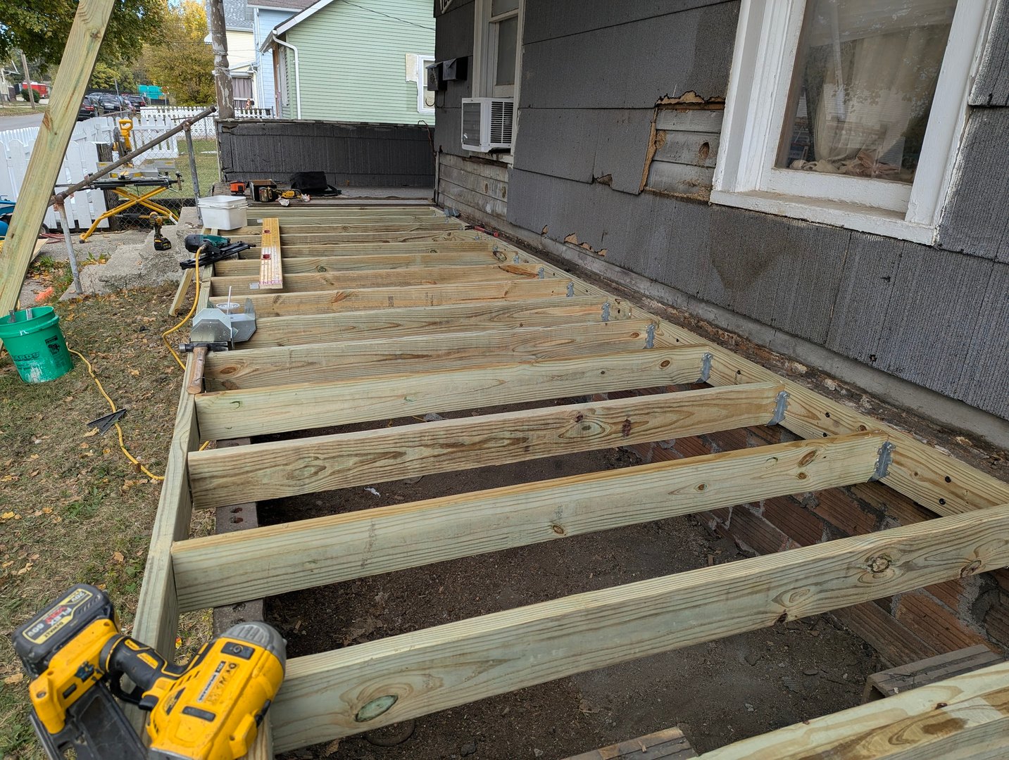 Structural repair work showing professional framing and beam installation