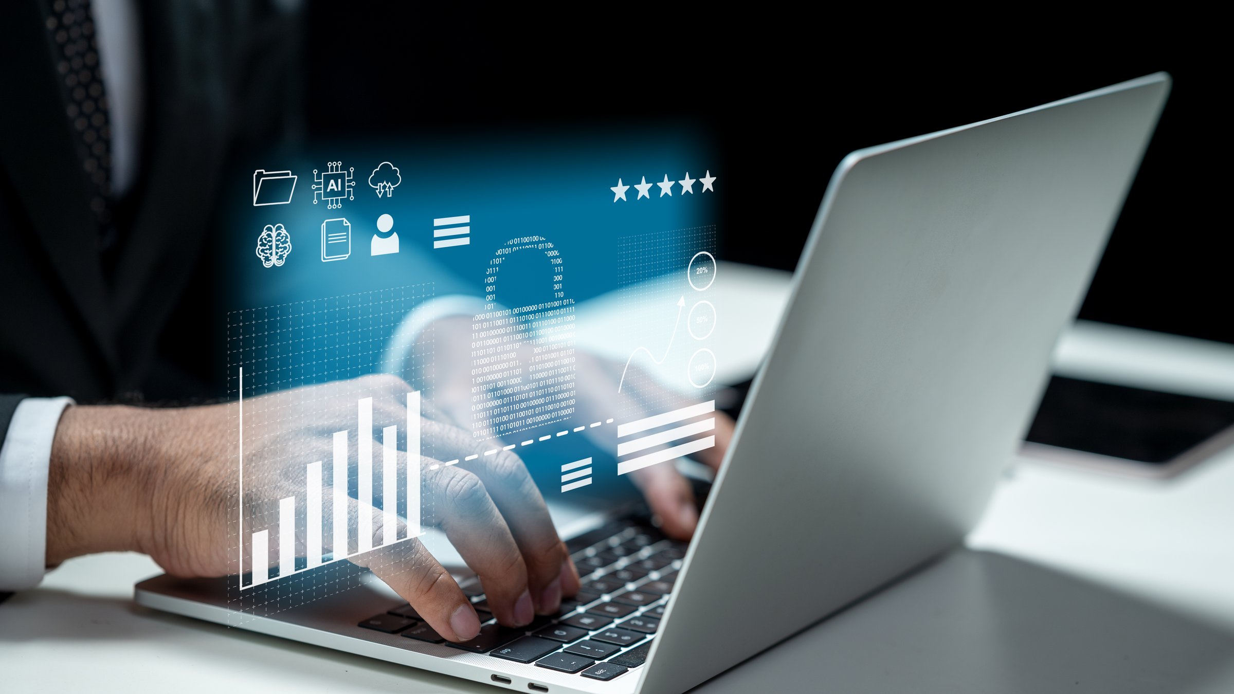 Businessman using laptop and showing virtual icon of padlock. Tablet on the table. Technology innovation on a virtual screen. Concept of Cybersecurity, data protection, or digital information privacy