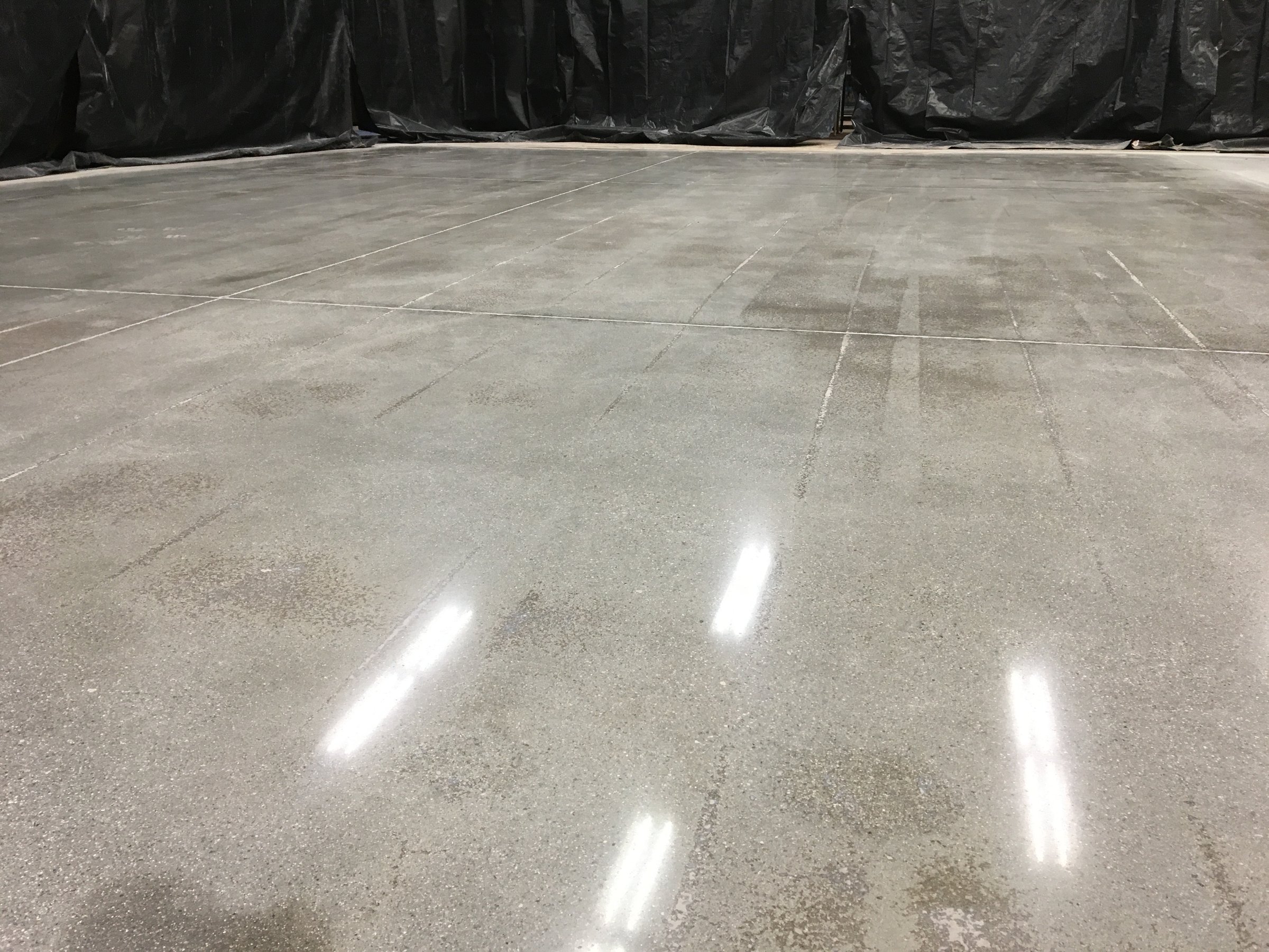 Section of Polished Concrete Floor During Overnight Store Remodel . High quality photo