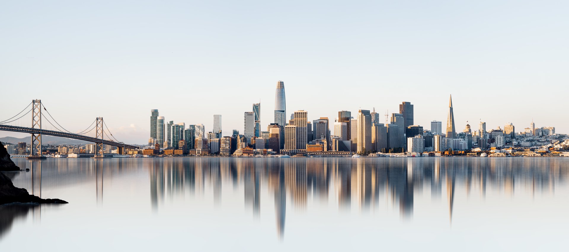 the refelcted skyline of san francisco during sunrise