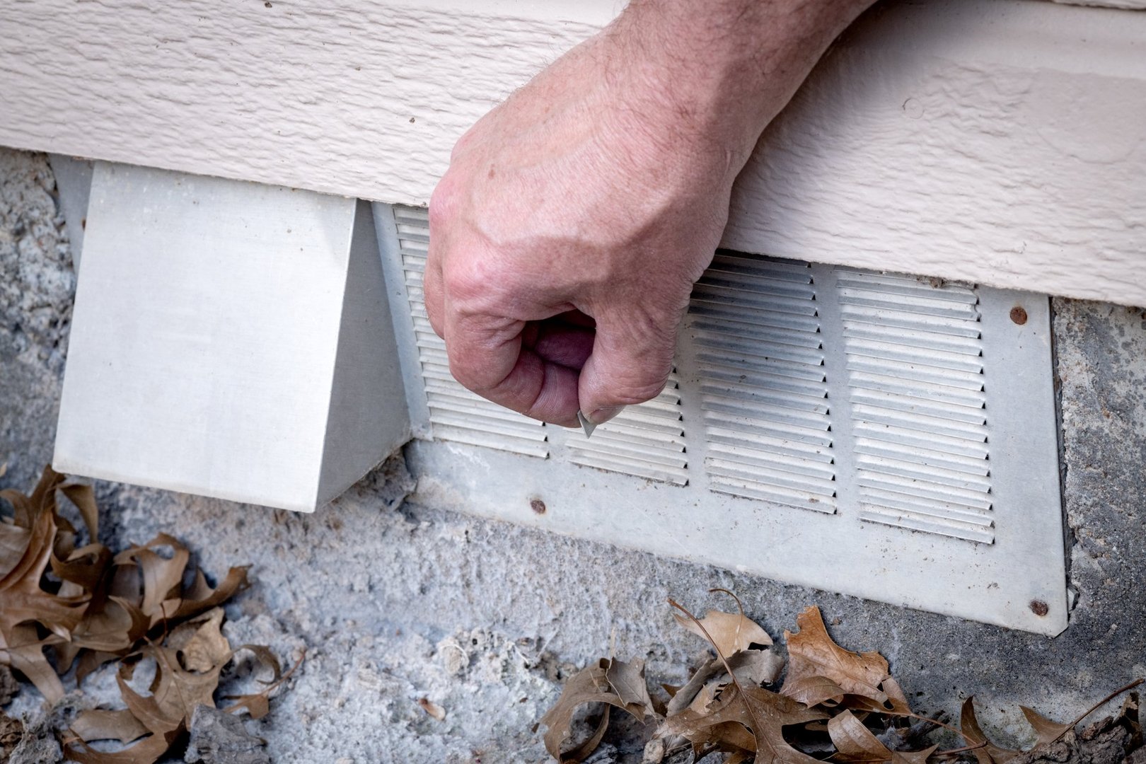 Lever is used to close a foundation vent on a residence