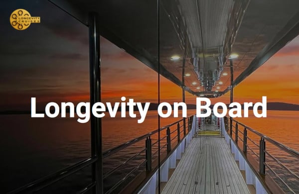 A sunset view from a ships deck with Longevity on Board text overlay. The deck has railings and overhead lights.