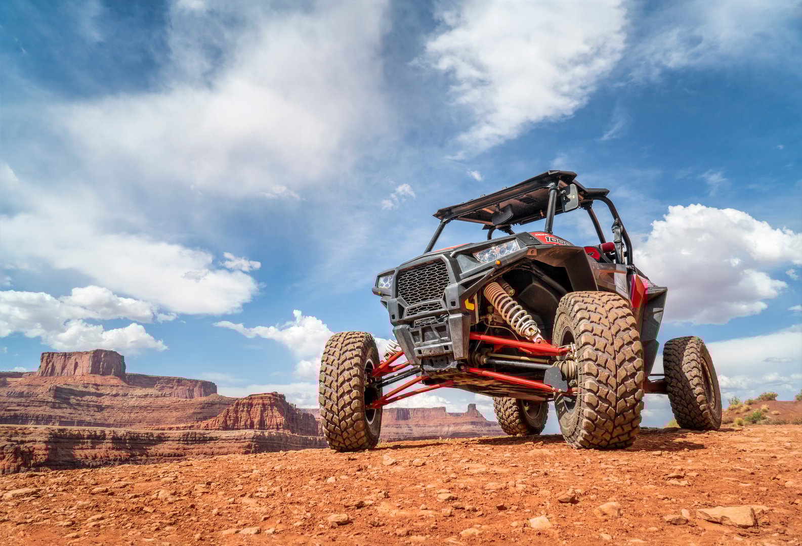 MOAB, UT, USA - MAY 7, 2017: Polaris RZR ATV on a popular Chicken Corner 4WD trail in the Moab area.