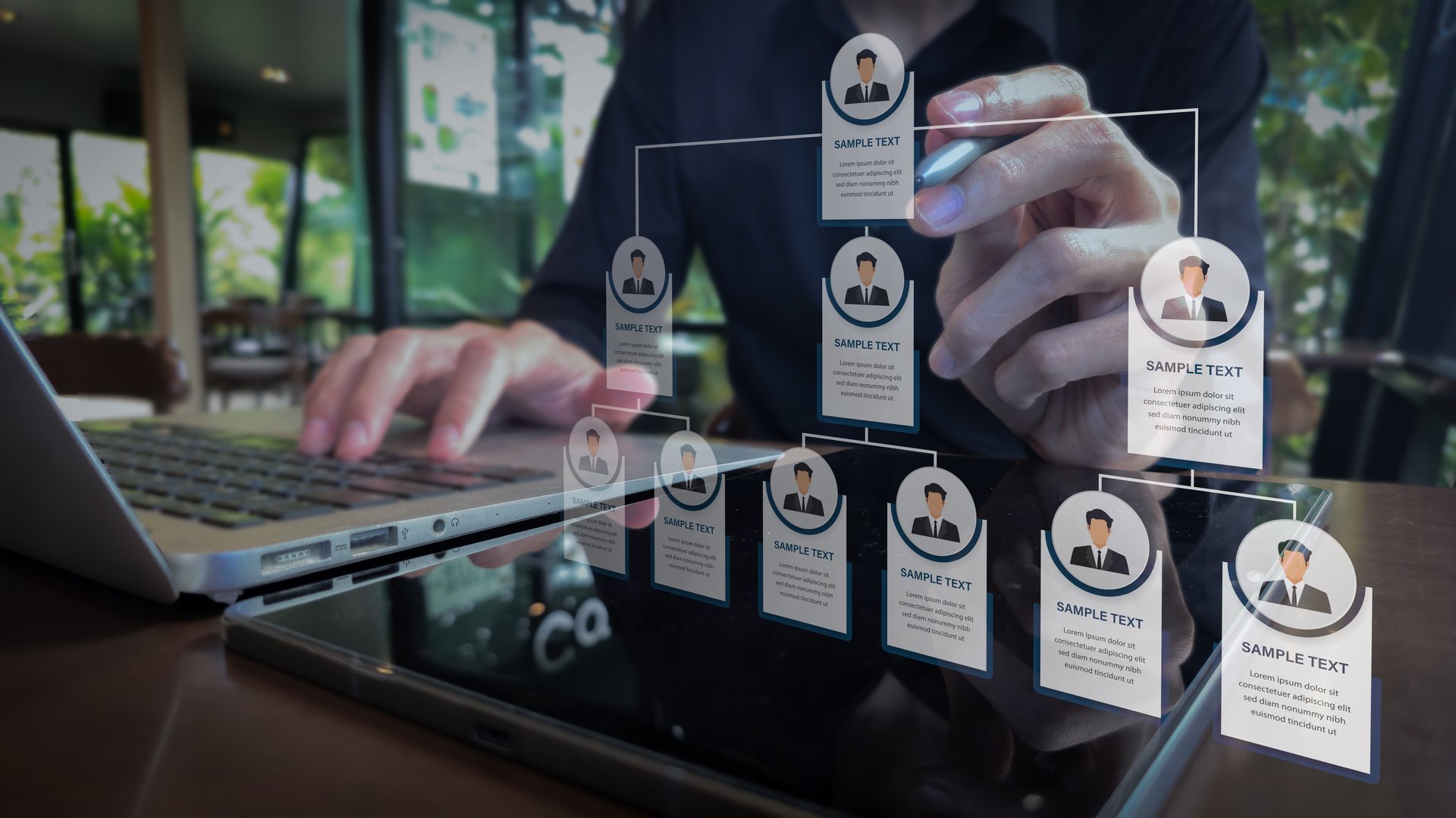 Interactive Organizational Chart with Tablet and Laptop in Business Environment