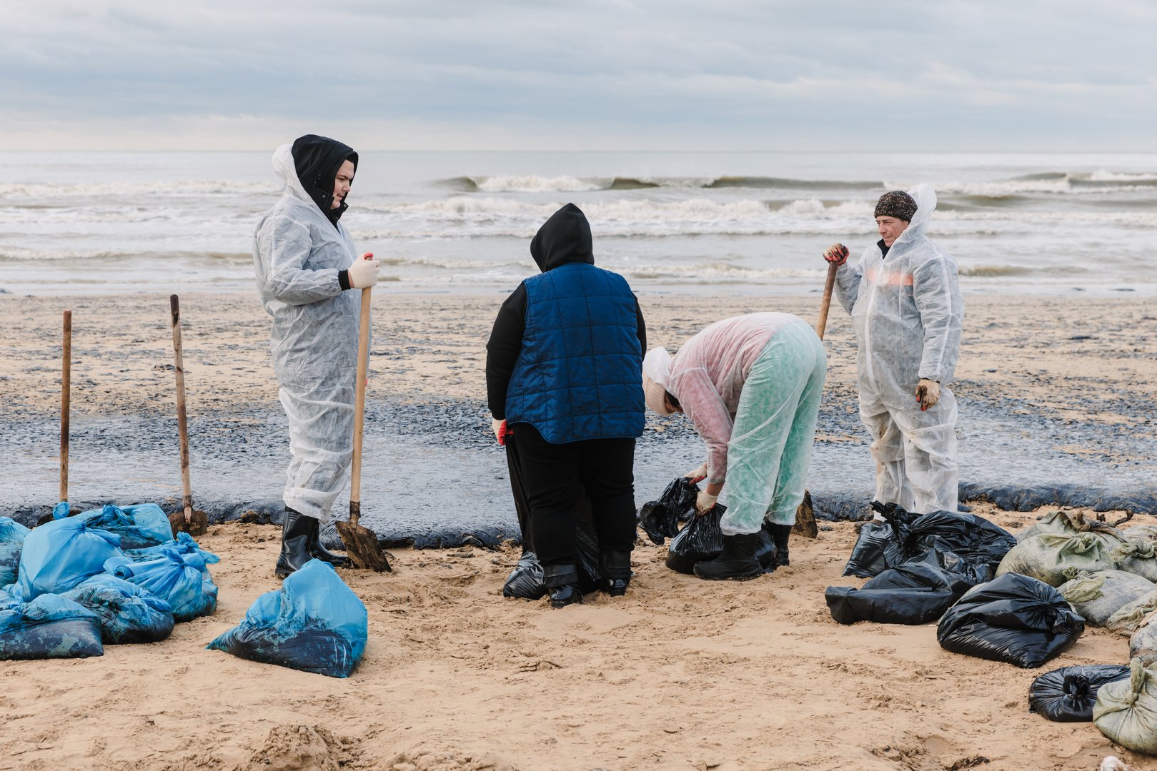 December 19, 2024. Anapa, Russia. Volunteers clean the sea coast from oil after a tanker wreck
