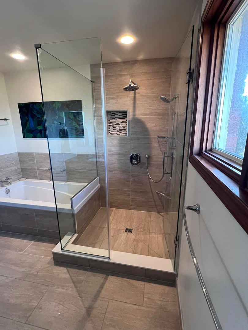 Completed shower remodel with elegant tile design