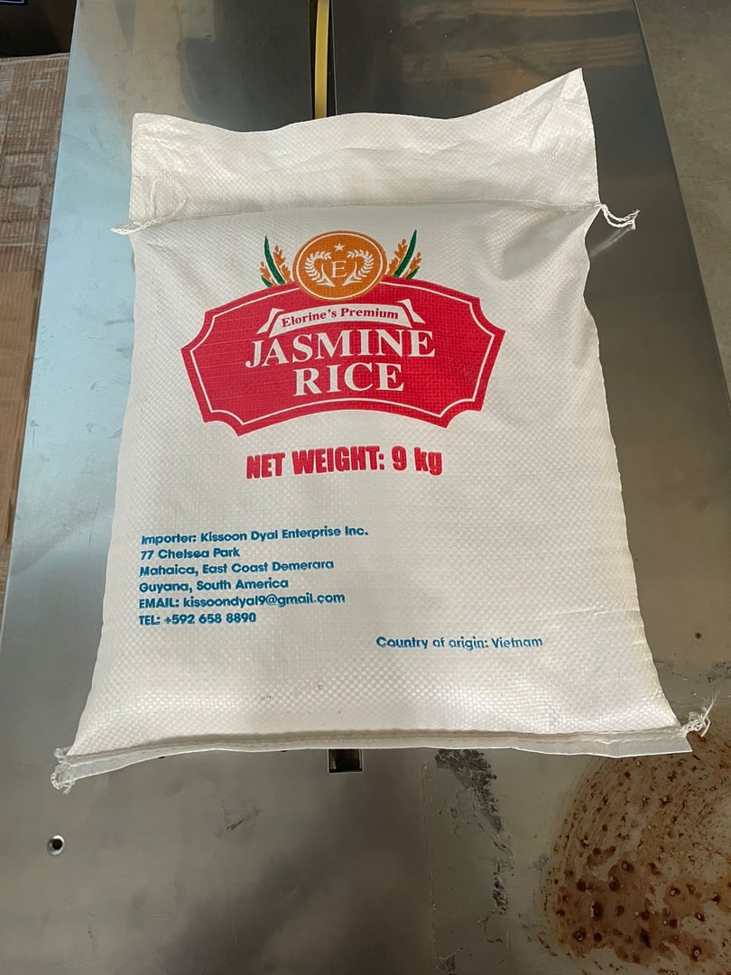 A 9 kg bag of Jasmine rice labeled Kissoons Premium with importing details from Guyana, South America.
