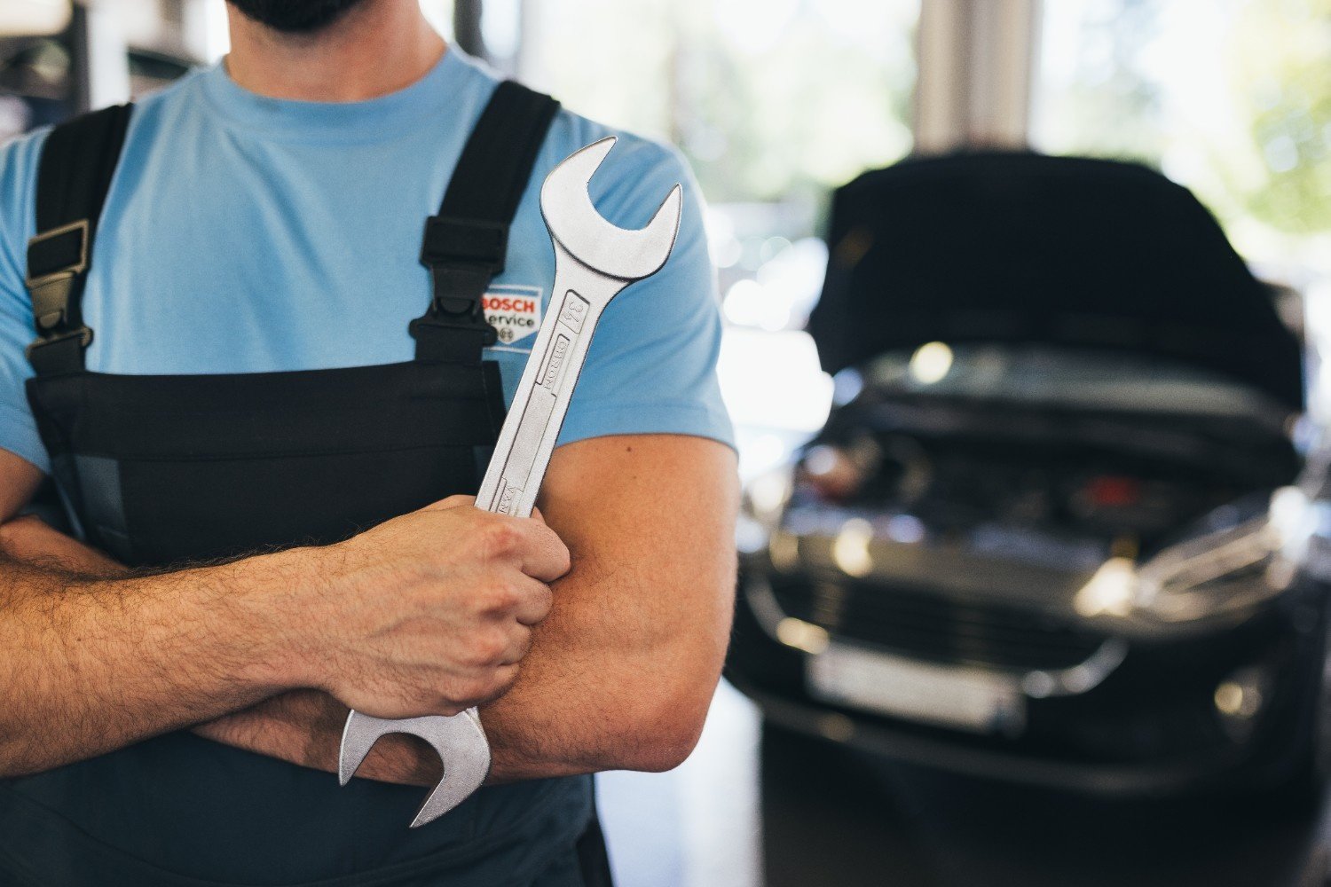 Mechanic working on vehicle