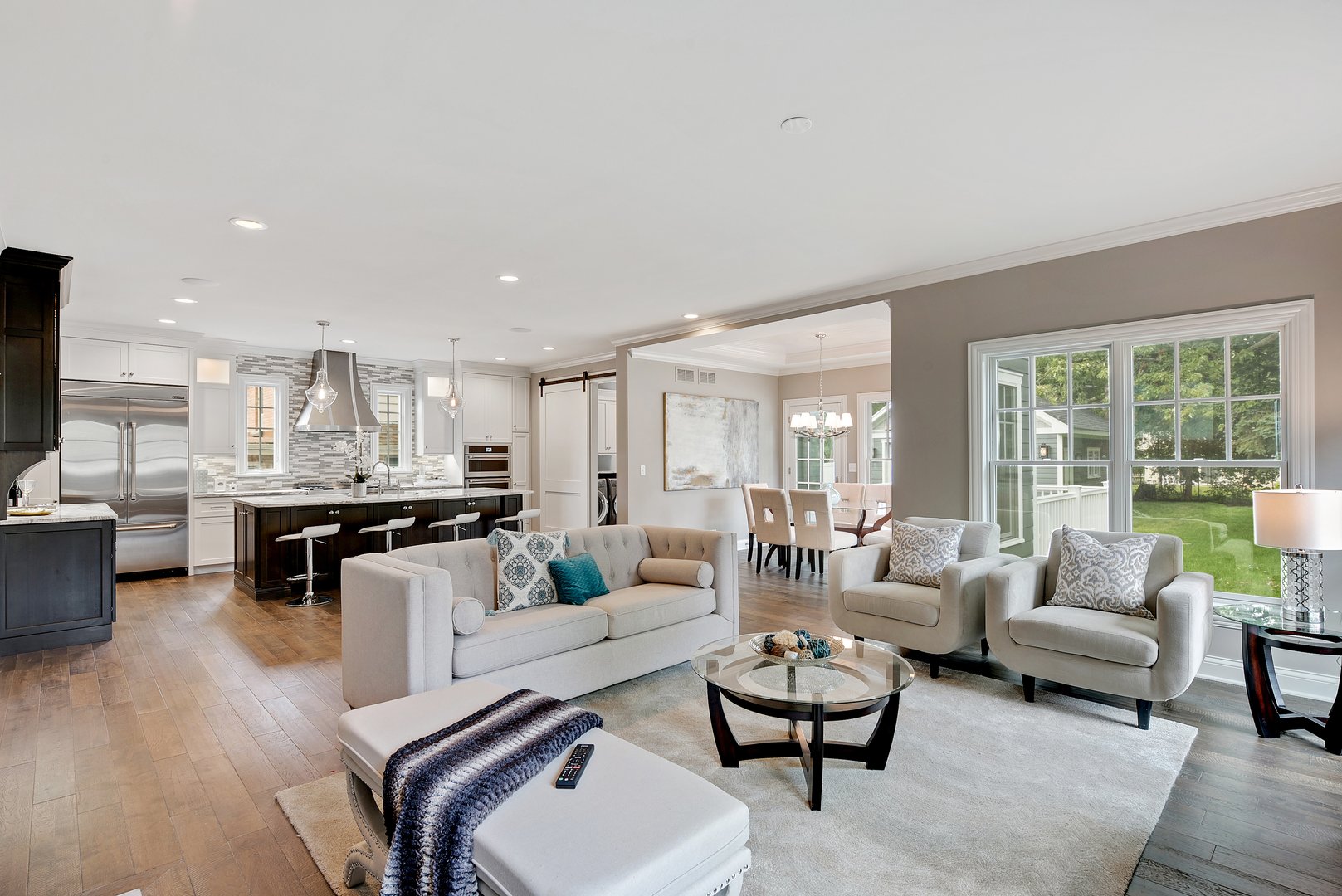 Great room and kitchen connected for hosting