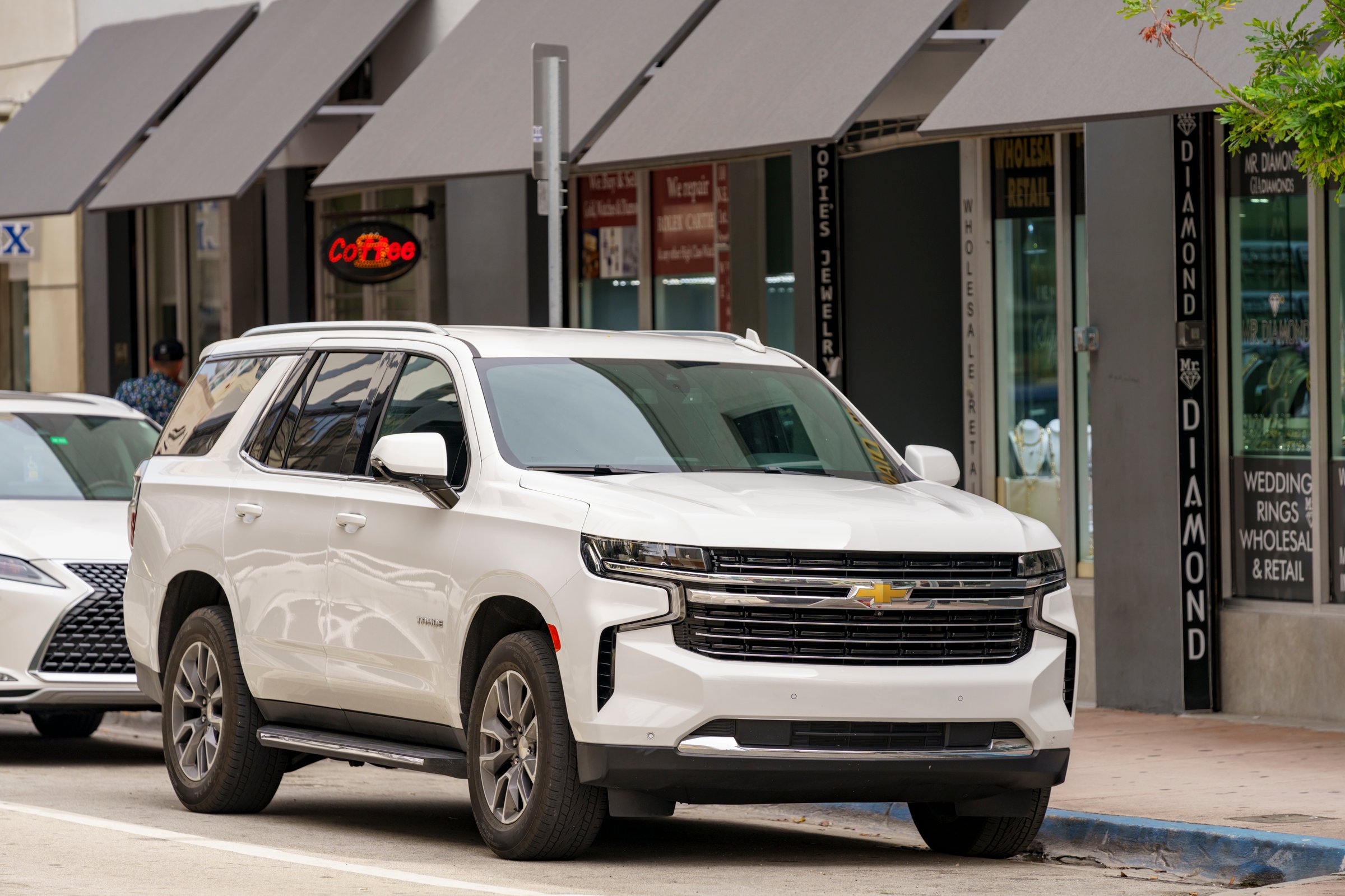 Miami, FL, USA - September 25, 2024: Photo of a 2023 Chevy Tahoe white passenger front quarter view