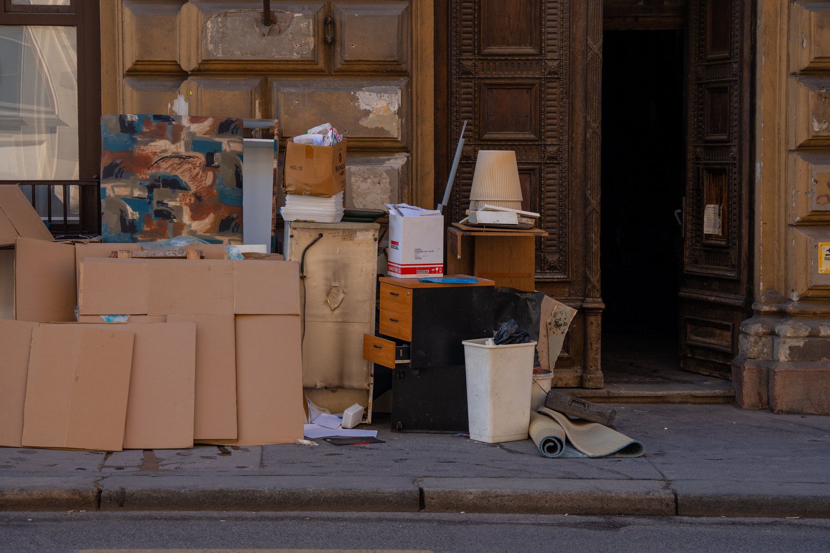 Budapest, Hungary - March 8, 2024: Bulky Waste on Budapest Streets - Discarded furniture and appliances clutter sidewalks