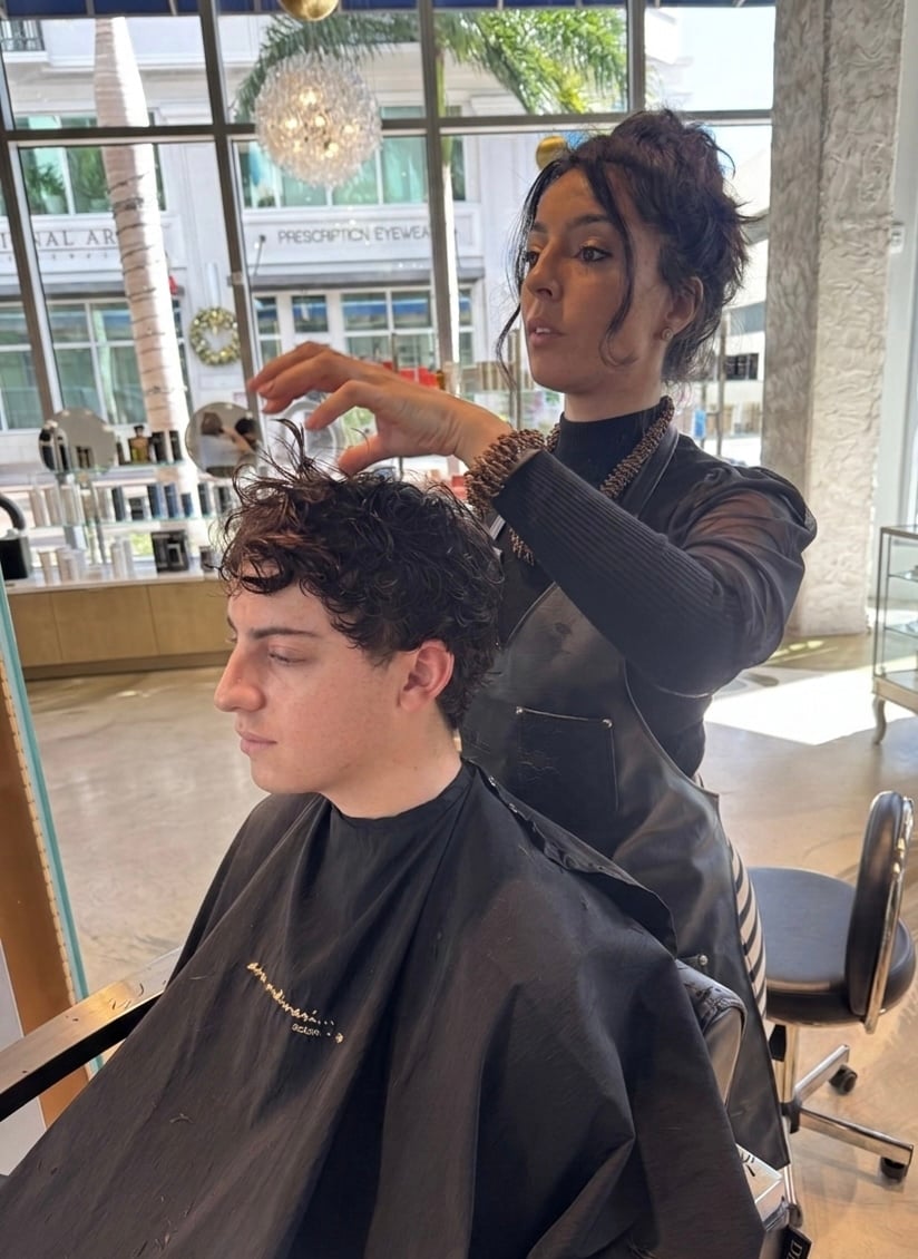 Signature haircut service - professional barber styling at The Q Salon Sarasota