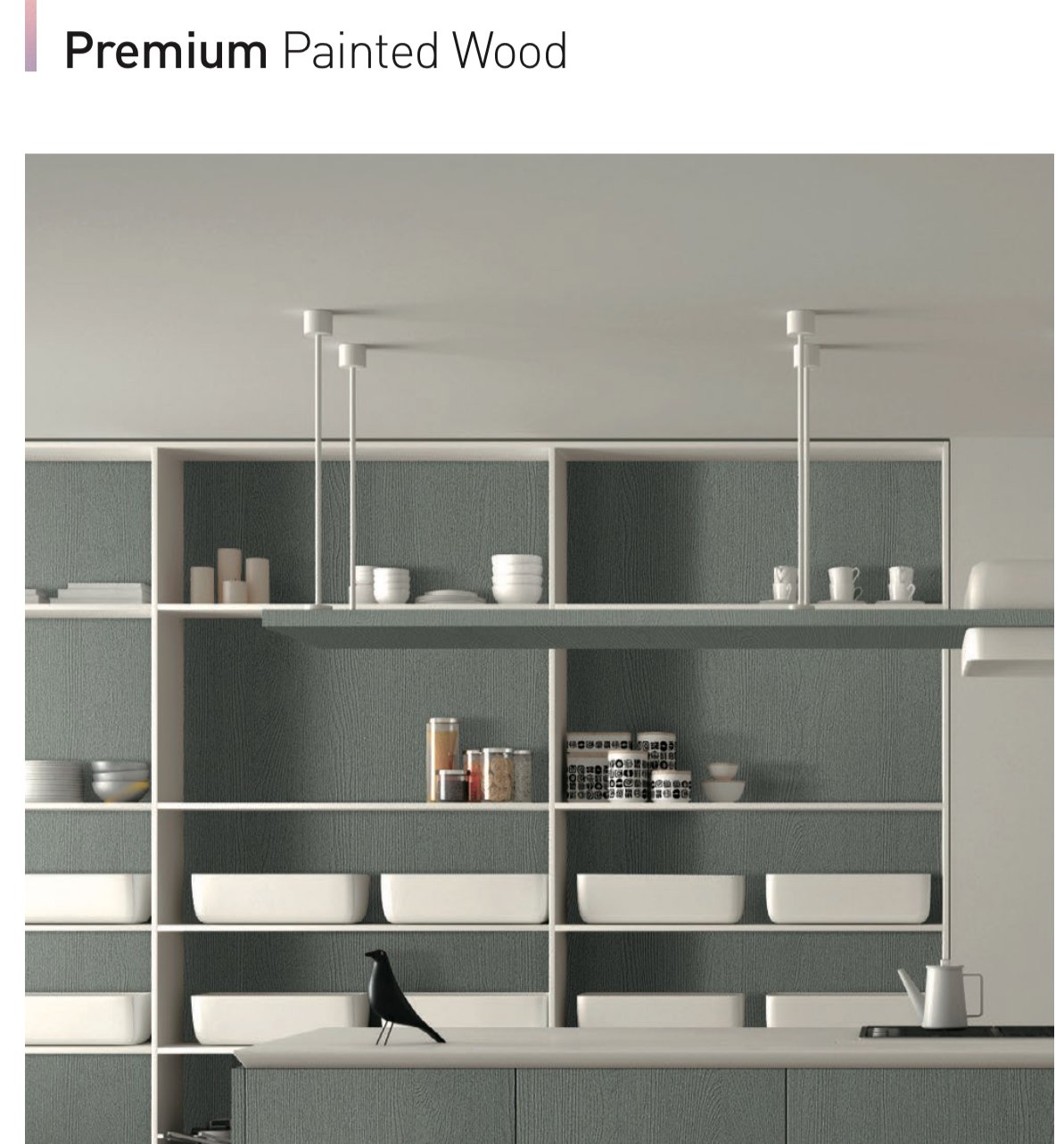 Modern kitchen shelves with painted wood finish, displaying dishes and decorative items, with overhead lighting.