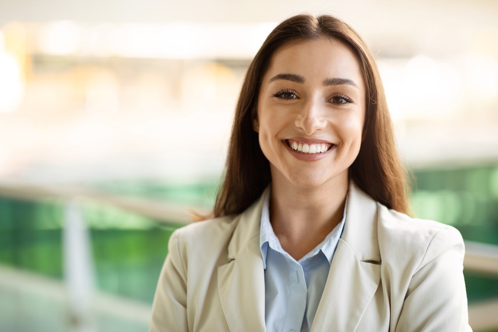 Headshot portrait of cheerful pretty confident young woman in suit enjoy work in city outdoors, close up. Business, startup, video call and positive lifestyle, ad and offer