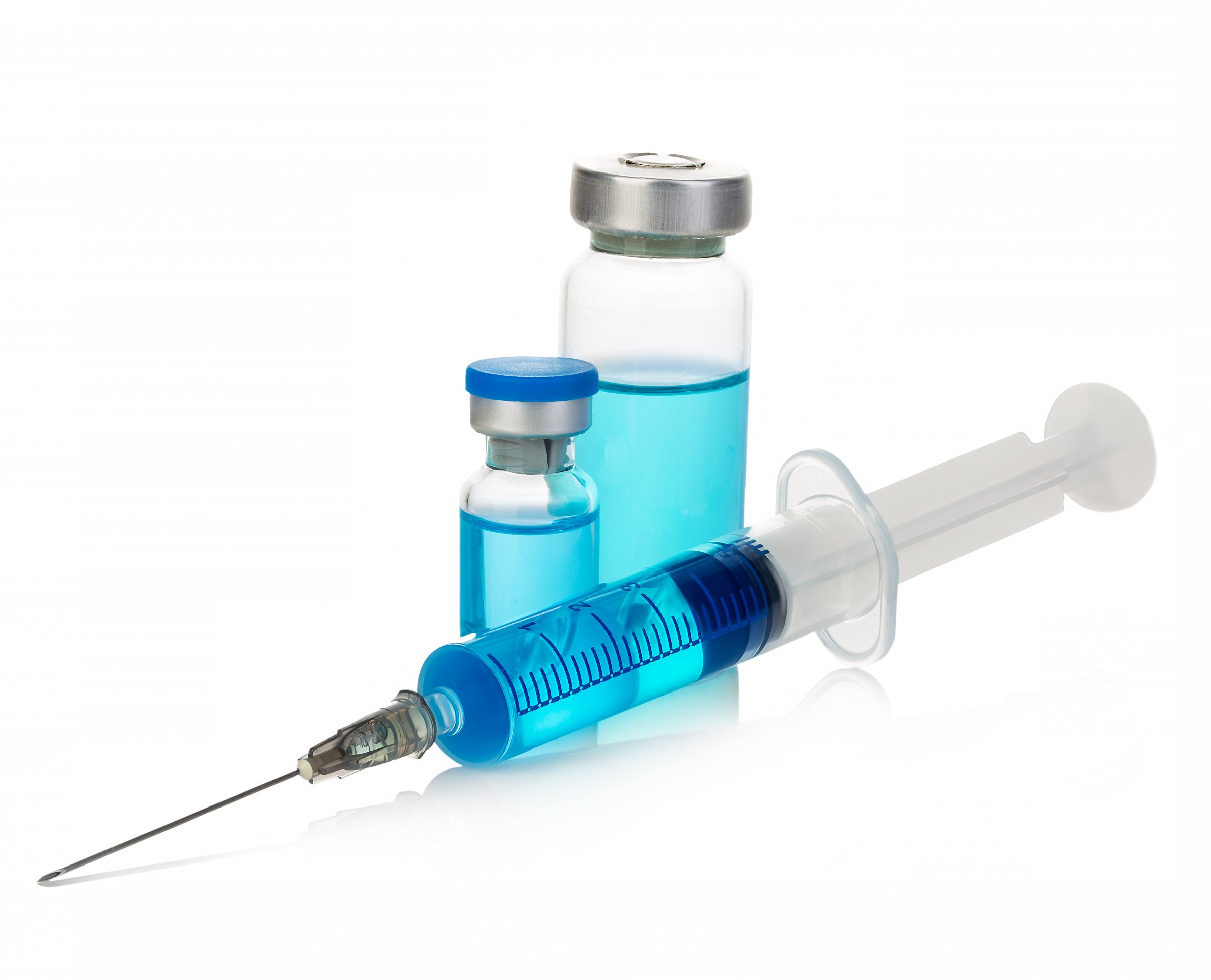 Sterile medical vials with blue medication solution, ampoules, and syringe isolated on a white background.