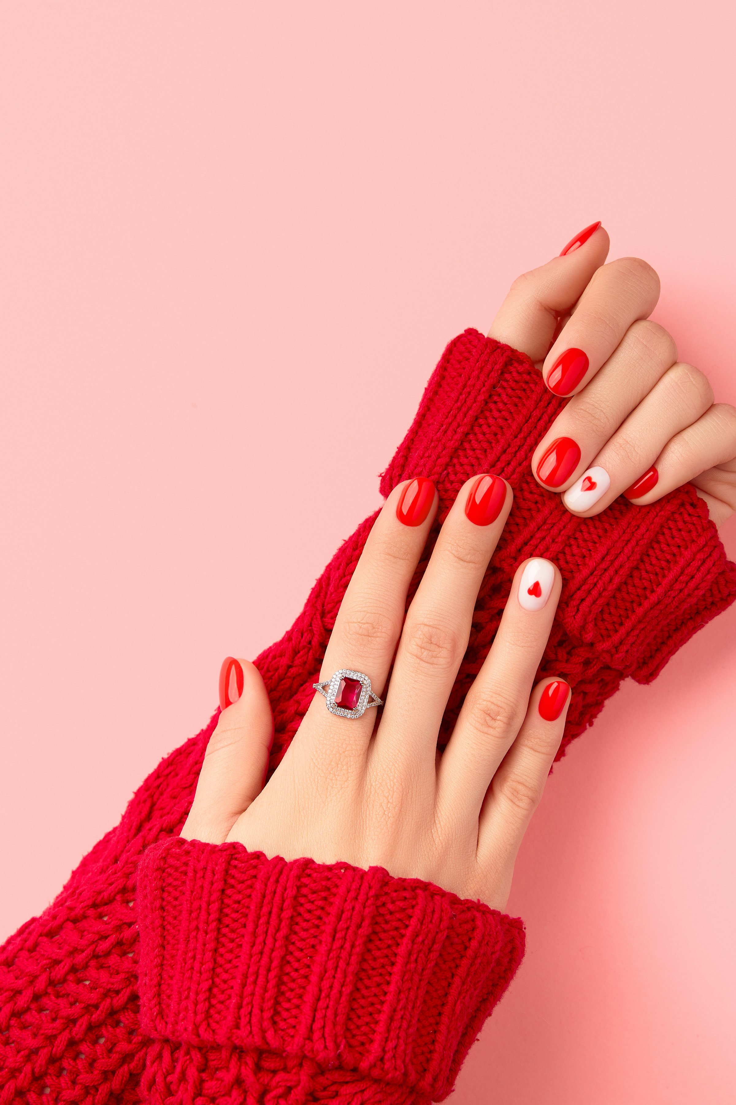 Vibrant and Colorful Nail Art Design on a Light-Skinned Female Hand