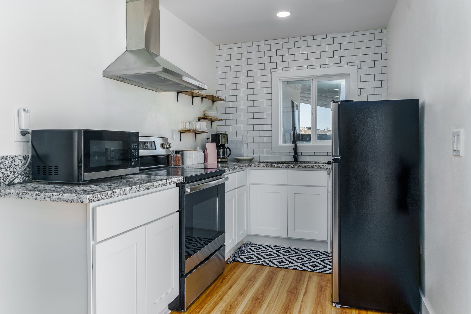 White kitchen with subway tile backsplash