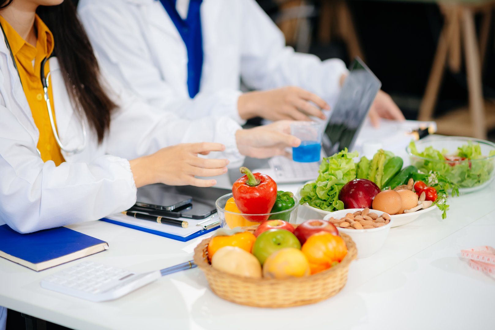 Doctors sharing fresh vegetables, promoting health and nutrition. Ideal for wellness, healthcare, and science themes. Perfect for healthy lifestyle visuals