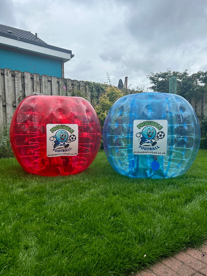 Bubble football players in action