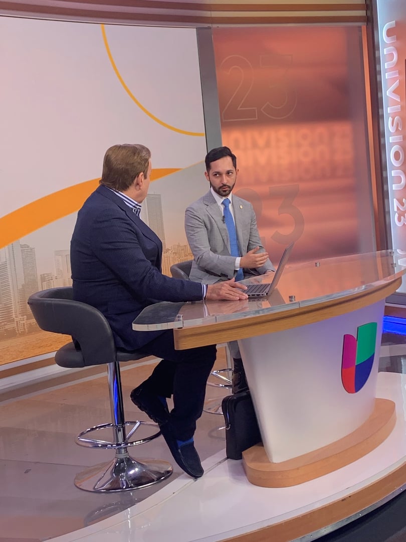 Juan Carlos Porras speaking at media event - Spanish media expertise