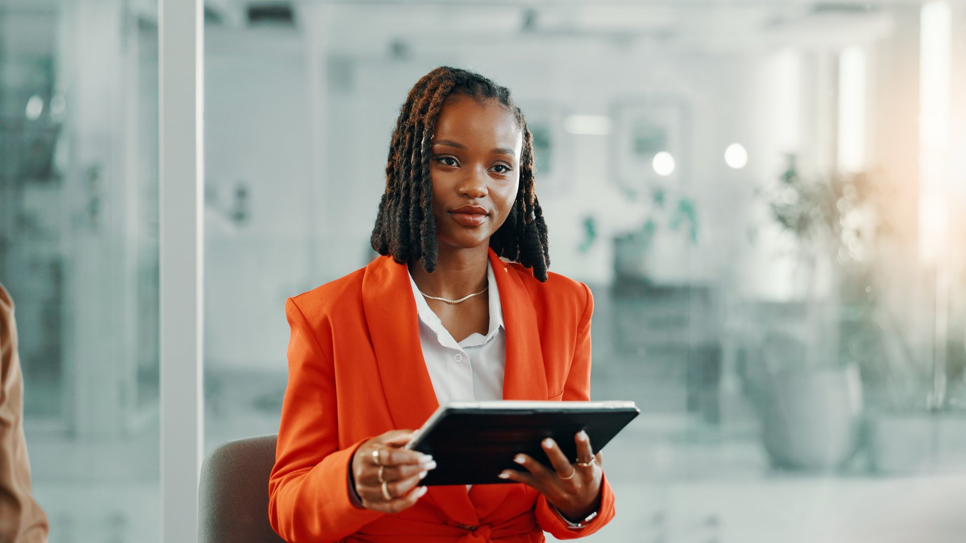 Business, connection and black woman in office, tablet and email with website info. African person, magazine editor and employee in workplace, tech and confidence with pride, social media and app