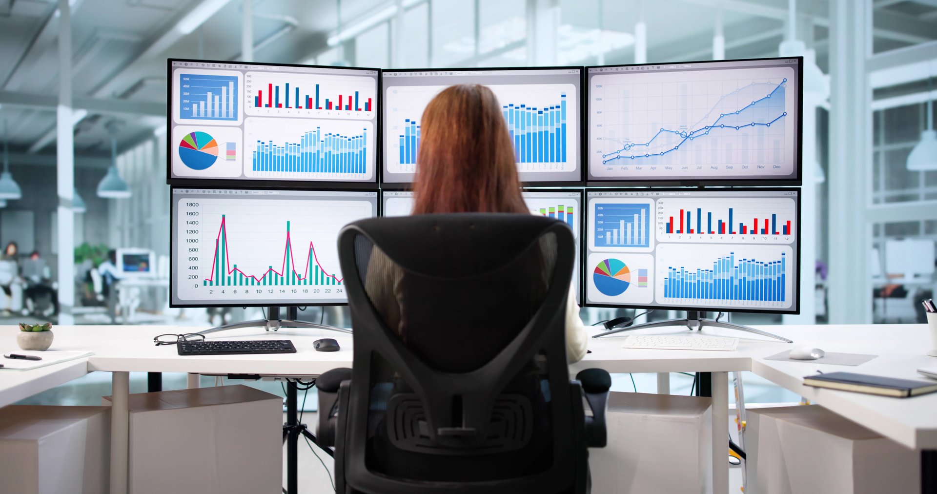 Business Analyst Tracking Market Performance On Data Dashboard Computer Screen