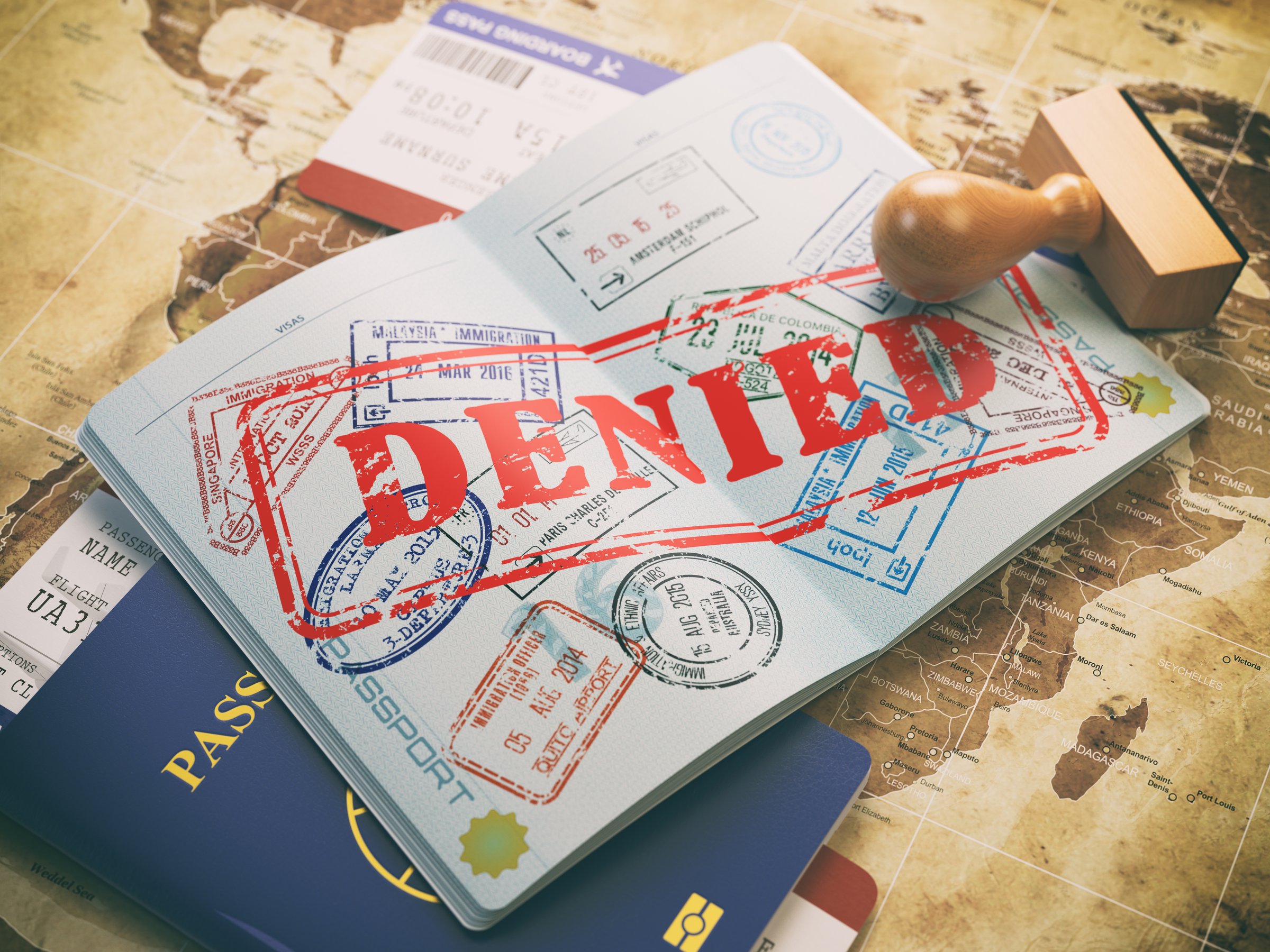 Passport with denied visa stamp concept
