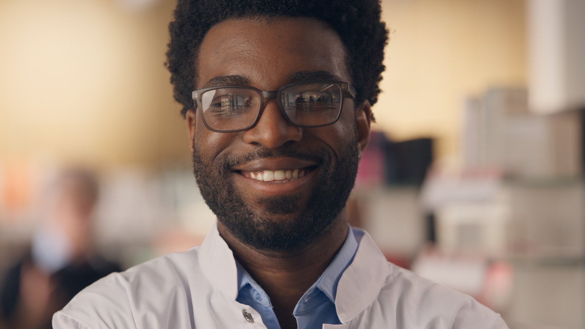 Happy doctor African American man smiling health insurance medicine pharmacy professional medical checkup physician healthy therapy clinic male practitioner close up looking camera smile dental care. High quality 4k footage