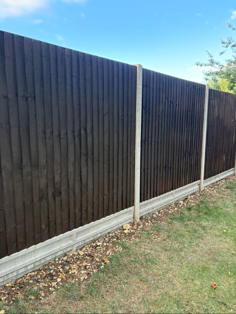 Professional fence weatherproofing and painting after treatment
