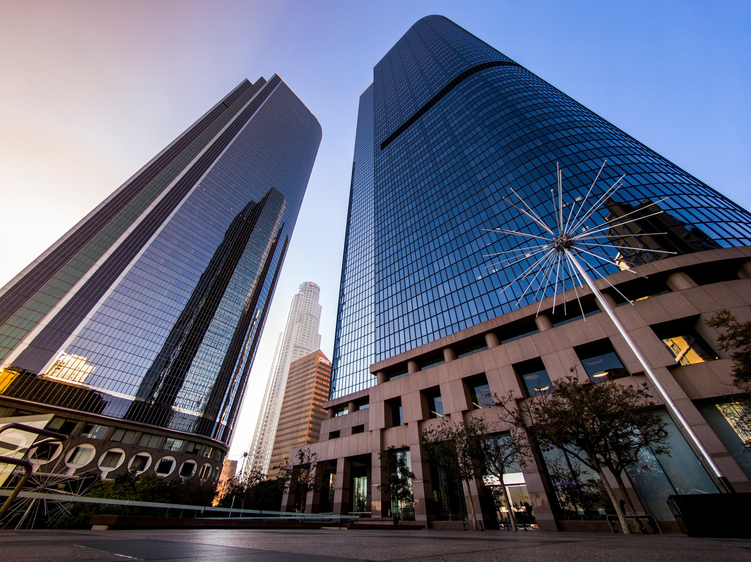 Tall glass modern skyscrapers in Bunker Hills District in Los Angeles California in downtown plaza setting, mid morning, no people, winter