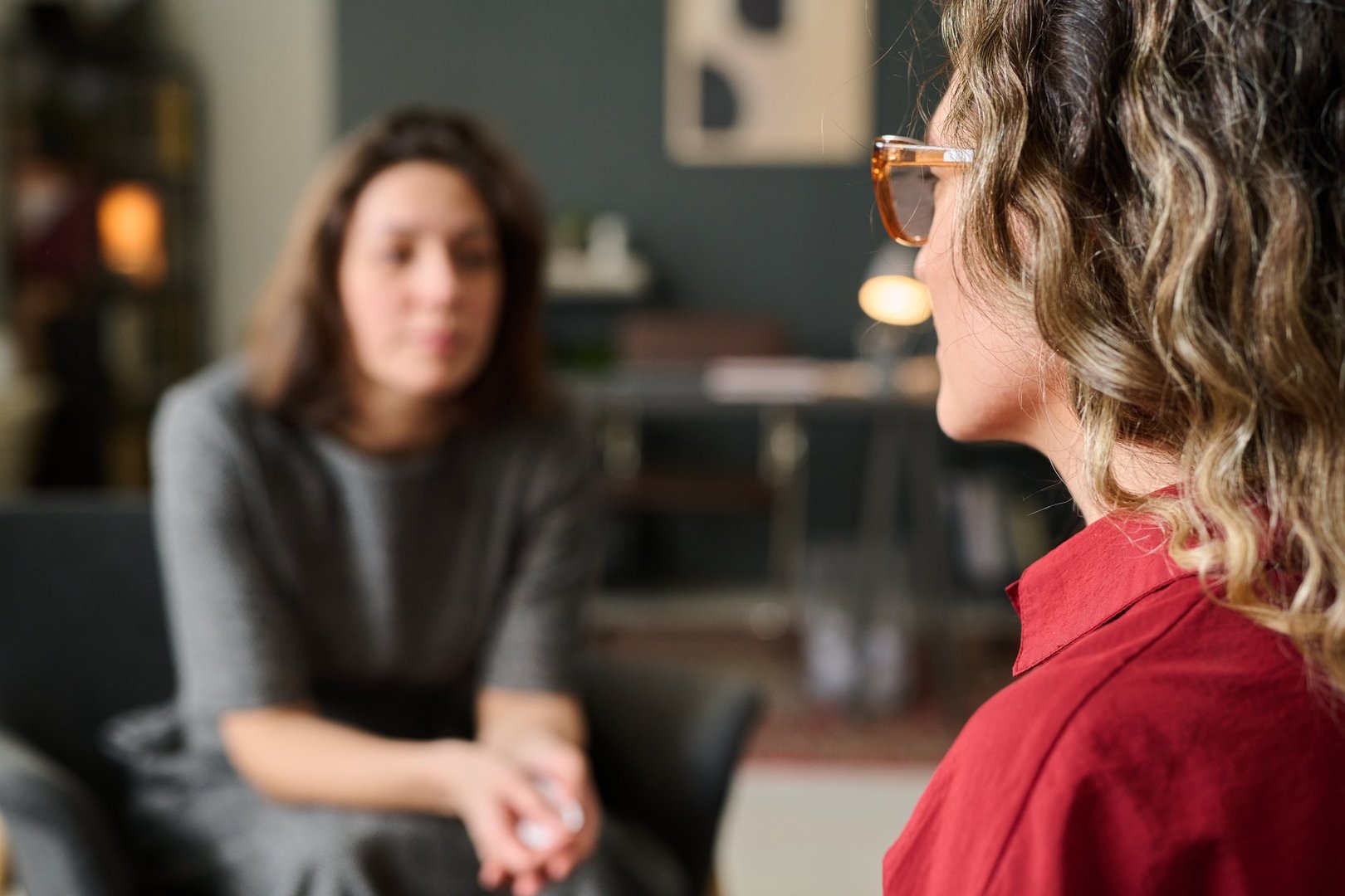 Two women engaging in counseling session