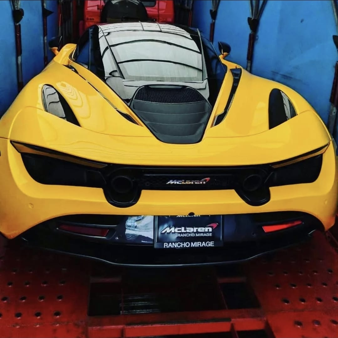 Enclosed car carrier with multiple vehicles